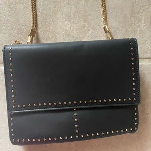 NWOT black crossbody bag - stuffing still in bag as seen in pics